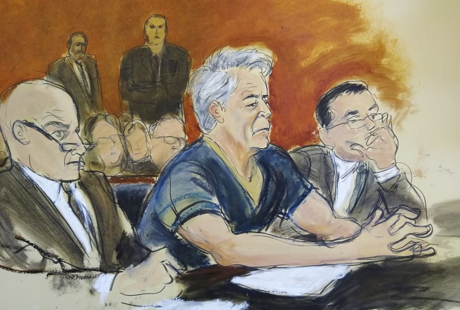 In this courtroom artist’s sketch, defendant Jeffrey Epstein, center, sits with attorneys Martin Weinberg, left, and Marc Fernich during his arraignment in New York federal court, Monday, July 8, 2019. Epstein pleaded not guilty to federal sex trafficking charges. The 66-year-old is accused of creating and maintaining a network that allowed him to sexually exploit and abuse dozens of underage girls from 2002 to 2005.