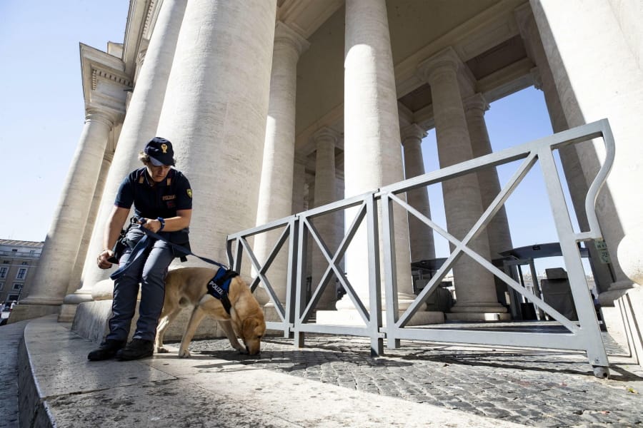 An Italian police officer and her dog perform security checks in St. Peter’s Square at the Vatican ahead of Russian President Vladimir Putin’s visit, Thursday, July 4, 2019. Putin is emphasizing historically strong ties with Italy before a one-day visit to Rome that will include a meeting with Pope Francis.