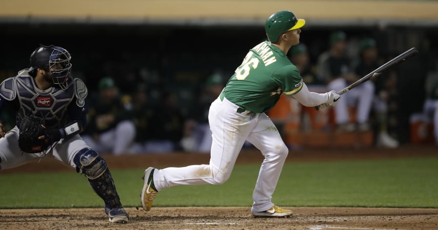 Oakland Athletics’ Matt Chapman watches his two-run home run off Seattle Mariners’ Marco Gonzales during the fifth inning of a baseball game Tuesday, July 16, 2019, in Oakland, Calif.