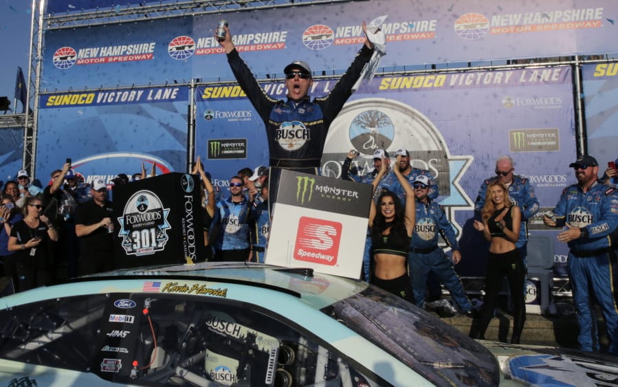 Kevin Harvick celebrates in victory lane after winning a NASCAR Cup Series auto race at New Hampshire Motor Speedway in Loudon, N.H., Sunday, July 21, 2019.