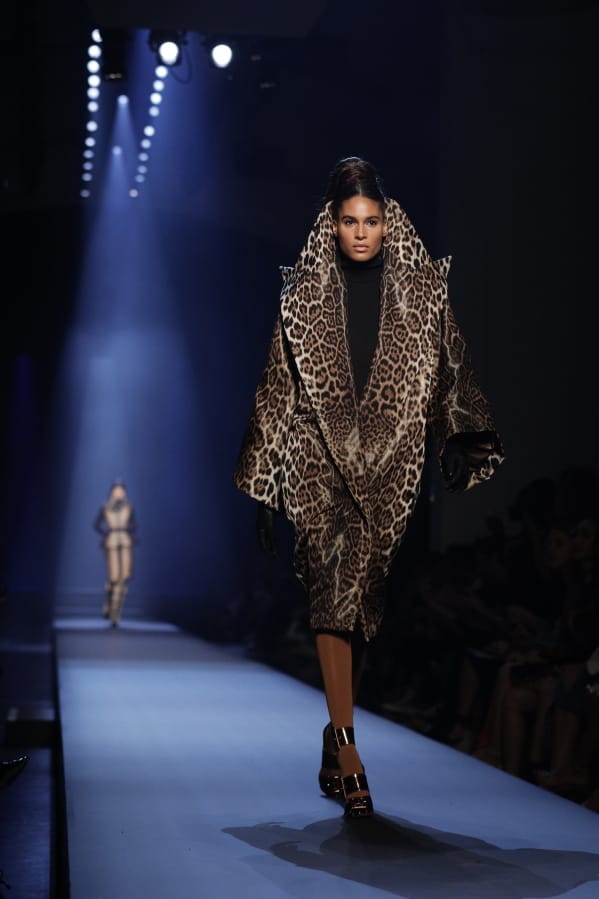 Model Cindy Bruna wears a creation for the Jean Paul Gaultier Haute Couture Fall-Winter 2020 fashion collection presented Wednesday in Paris.
