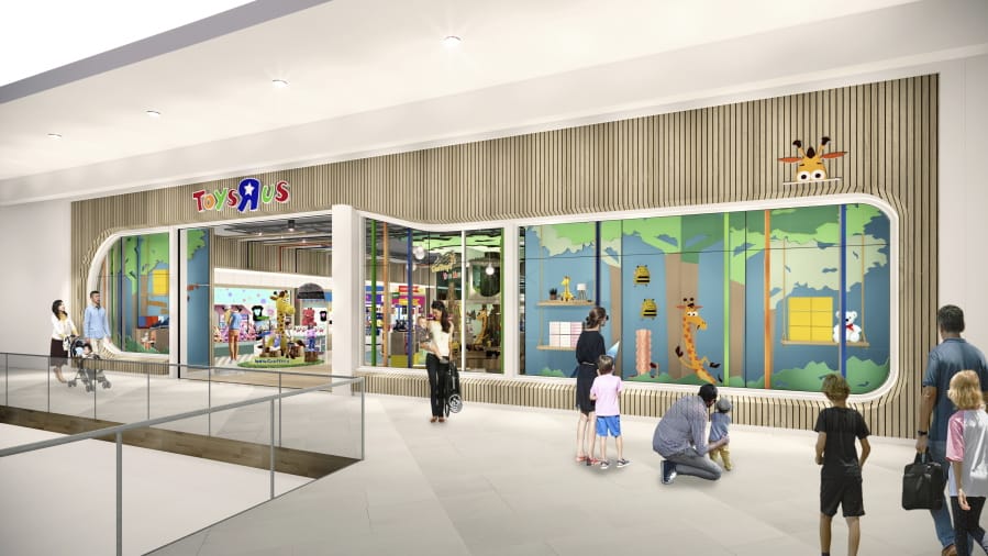 This undated artist rendering provided by Toys”R”Us shows an artist rendering of a new store, which will be about 6,500 square feet — a fraction of the brand’s former big box stores, which were about 30,000 square feet. Richard Barry, a former Toys R Us executive and now CEO of the new company called Tru Kids Brands, said the company has entered a partnership with a startup called b8Ta, an experiential retailer to launch what Barry calls an interactive store experience based on a consignment model. Toy makers will pay for space in the stores but will get all the sales.