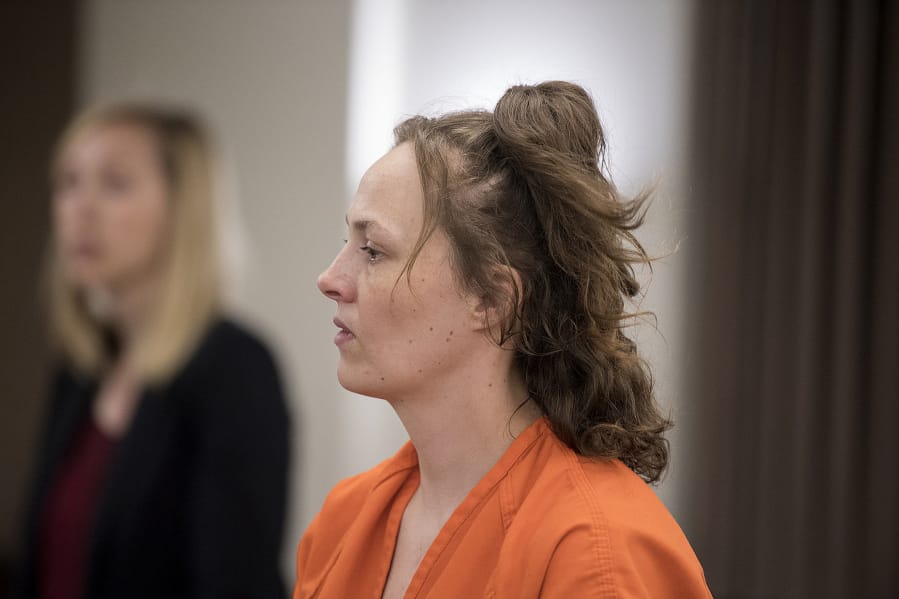 Ashley Lorraine Barry enters the courtroom May 8, 2017, after making a first appearance in Clark County Superior Court in connection with the slaying of Raymond C. Brandon, whose body was found in April 2017 in a shed at a Hockinson residence. Barry pleaded guilty Wednesday to first-degree manslaughter for her role in Brandon’s death.