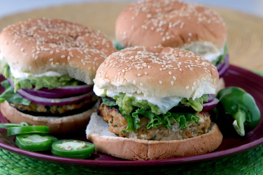 Cheddar jalapeño chicken burgers with guacamole Hillary Levin/St.