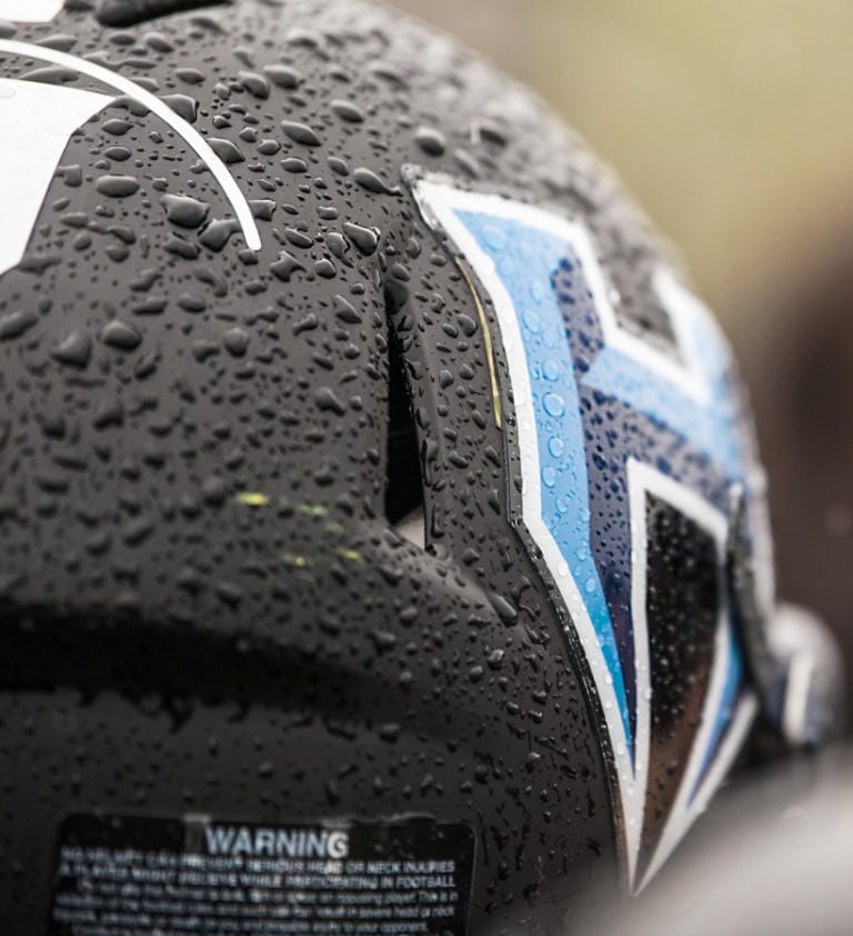 Rain drips off a Hockinson player’s helmet during the first day of prep football practices across Washington state on Wednesday.