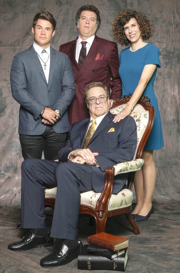 John Goodman, seated, plays the patriarch of an enormously wealthy televangelist family.