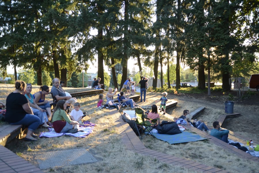 Families and friends get ready to watch a movie at the Water Works Park amphitheater during the summer of 2015. Though it once served as the site of performances and movie nights, the amphitheater has since been demolished to make room for a new water reservoir. There are currently no plans underway to build a new amphitheater at the park.