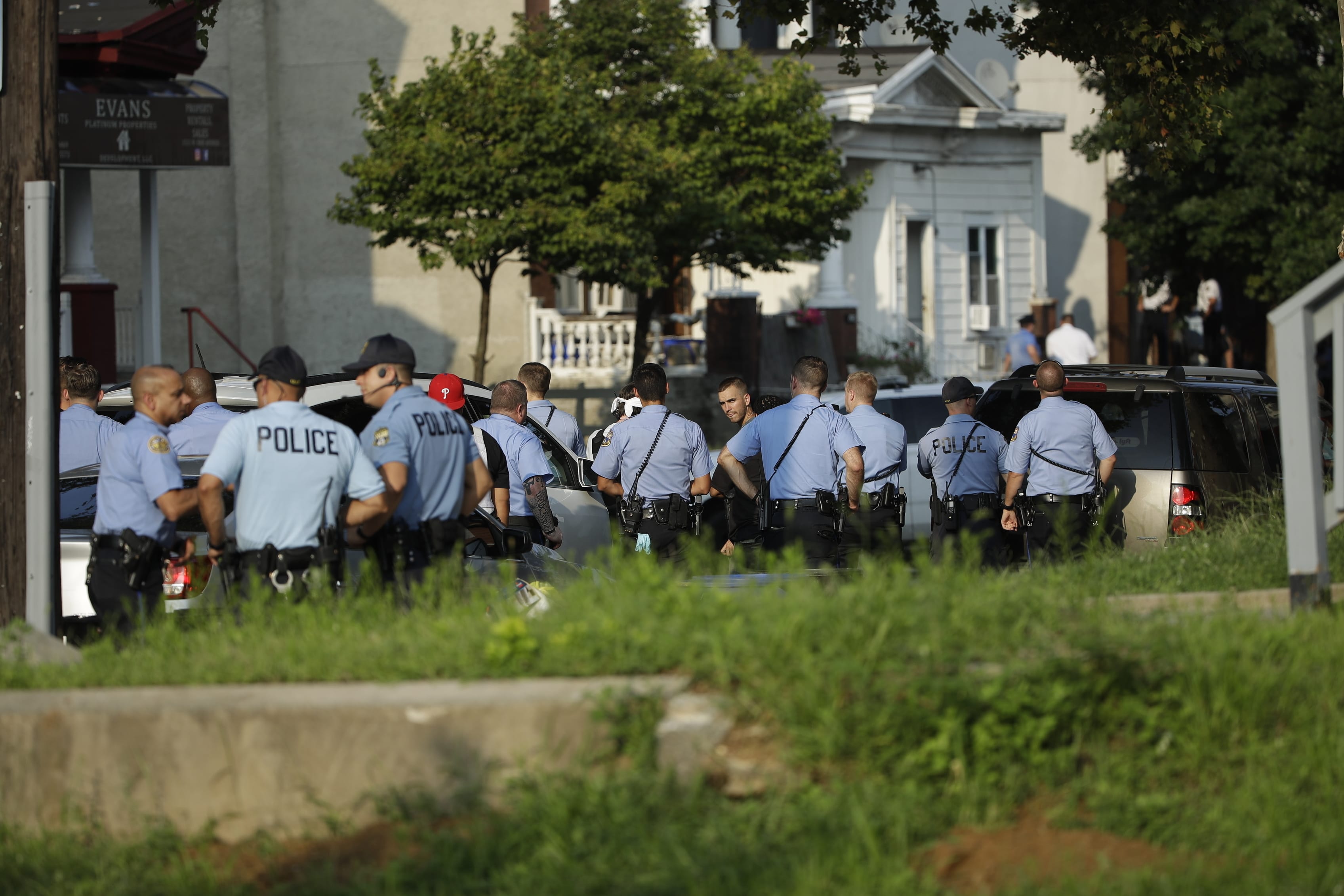 Authorities stage as they respond to an active shooting situation, Wednesday, Aug. 14, 2019, in the Nicetown neighborhood of Philadelphia.