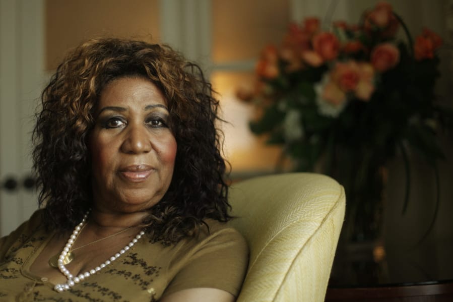FILE - This July 26, 2010 file photo shows performer Aretha Franklin in Philadelphia. As the anniversary of her death approaches, two of her doctors tell The Associated Press that the Queen of Soul handled the diagnosis and treatment with grace and the grit to keep performing for years with a rare type of cancer. Franklin, who died in Detroit on Aug. 16, 2018, at 76, had pancreatic neuroendocrine cancer.