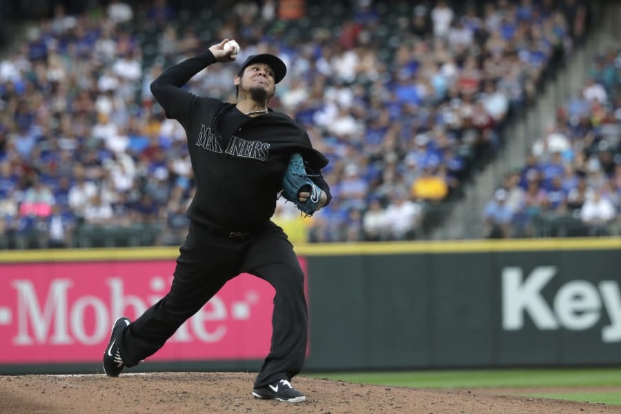 Seattle Mariners starting pitcher Felix Hernandez throws against the Toronto Blue Jays during the third inning of a baseball game Saturday, Aug. 24, 2019, in Seattle. (AP Photo/Ted S.