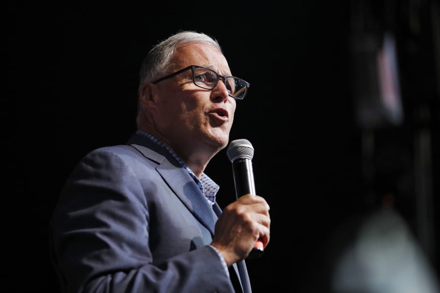 Washington Gov. Jay Inslee speaks at the Iowa Democratic Wing Ding at the Surf Ballroom, Friday, Aug. 9, 2019, in Clear Lake, Iowa.