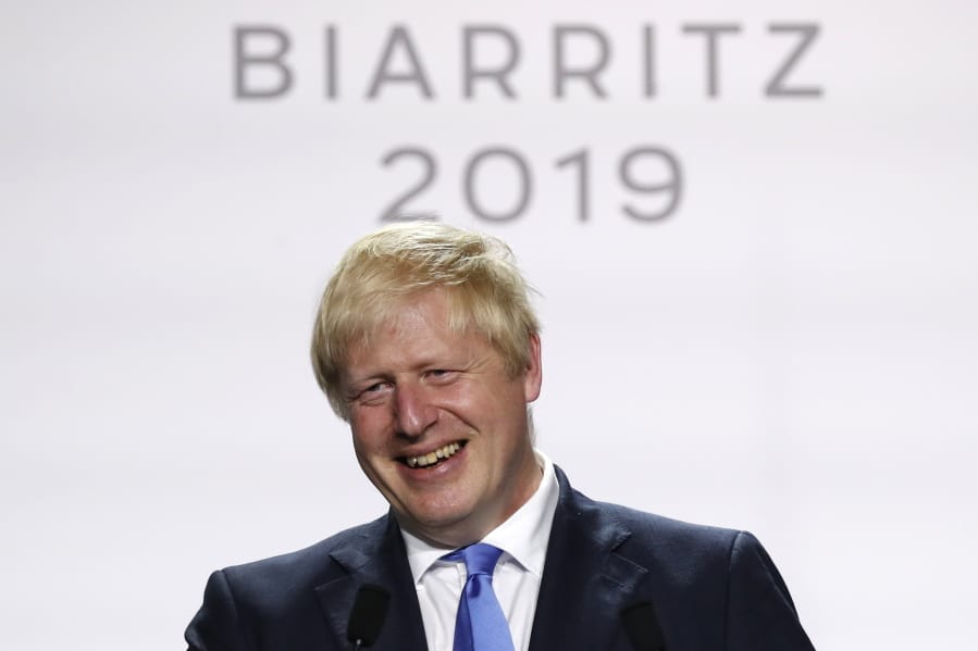 Britain’s Prime Minister Boris Johnson smiles during his final press conference at the G7 summit Monday, Aug. 26, 2019 in Biarritz, southwestern France.