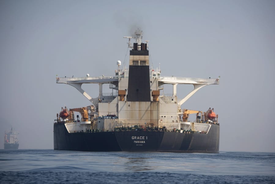 A stern view of the Grace 1 super tanker in the British territory of Gibraltar, Thursday, Aug. 15, 2019, seized last month in a British Royal Navy operation off Gibraltar. The United States moved on Thursday to halt the release of the Iranian supertanker Grace 1, detained in Gibraltar for breaching EU sanctions on oil shipments to Syria, thwarting efforts by authorities in London and the British overseas territory to defuse tensions with Tehran.
