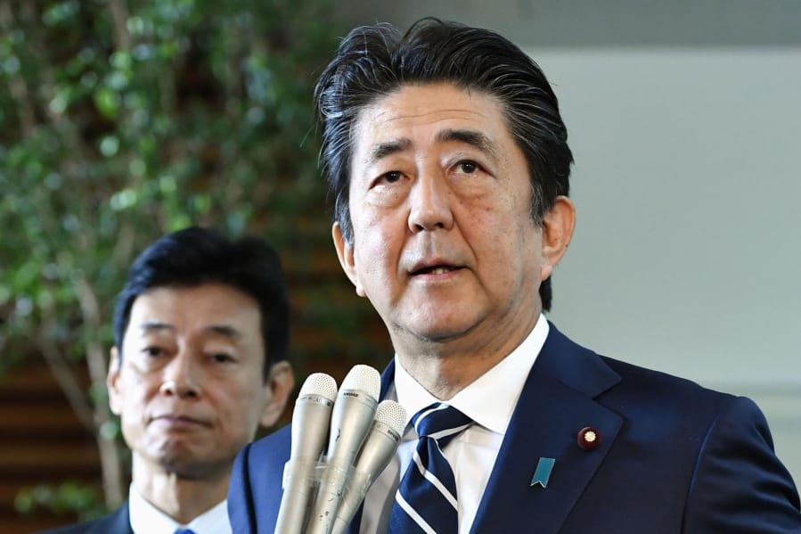 Japanese Prime Minister Shinzo Abe answers reporters’ questions at his official residence in Tokyo Friday, Aug. 23, 2019. Abe said South Korea’s decision to cancel a deal to share military intelligence is damaging mutual trust, and he vowed to work closely with the U.S. for regional peace. Abe also accused Seoul of not keeping past promises. The military agreement started in 2016.