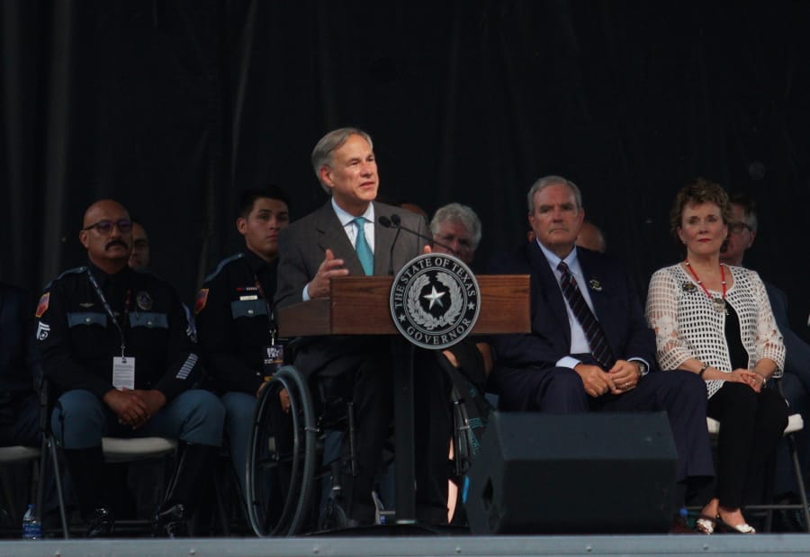 Gov. Greg Abbott speaks during a memorial service for the victims of the Aug. 3 mass shooting, Wednesday, Aug. 14, 2019, at Southwest University Park, in El Paso, Texas.