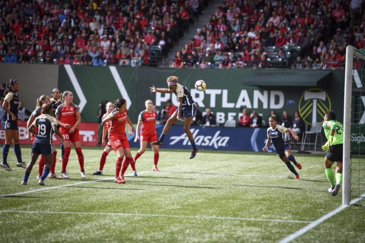 North Carolina Courage’s Jessica McDonald (14) heads the ball on goal during the team’s game against the Portland Thorns in Portland. The National Women’s Soccer League has seen overall attendance at its games go up 15 percent since the Women’s World Cup.