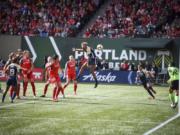 North Carolina Courage’s Jessica McDonald (14) heads the ball on goal during the team’s game against the Portland Thorns in Portland. The National Women’s Soccer League has seen overall attendance at its games go up 15 percent since the Women’s World Cup.