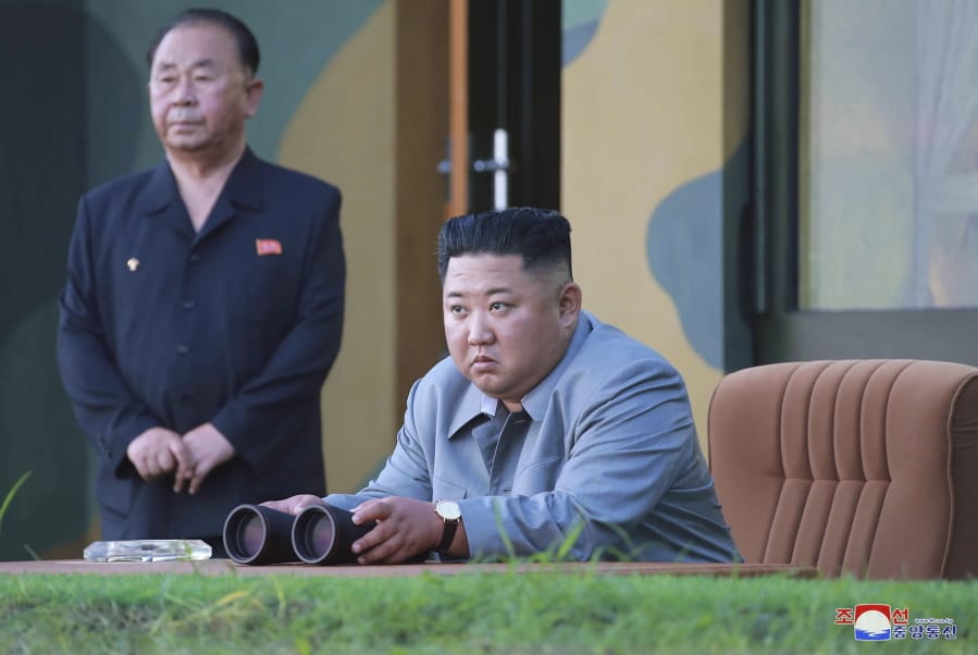 FILE - In this July 25, 2019, photo provided on Friday, July 26, 2019, by the North Korean government, North Korean leader Kim Jong Un watches a missile test in North Korea. South Korea’s military said Friday, Aug. 16, North Korea fired more projectiles into the sea to extend a recent streak of weapons tests believed to be aimed at pressuring Washington and Seoul over slow nuclear diplomacy. Independent journalists were not given access to cover the event depicted in this image distributed by the North Korean government. The content of this image is as provided and cannot be independently verified. Korean language watermark on image as provided by source reads: “KCNA” which is the abbreviation for Korean Central News Agency.