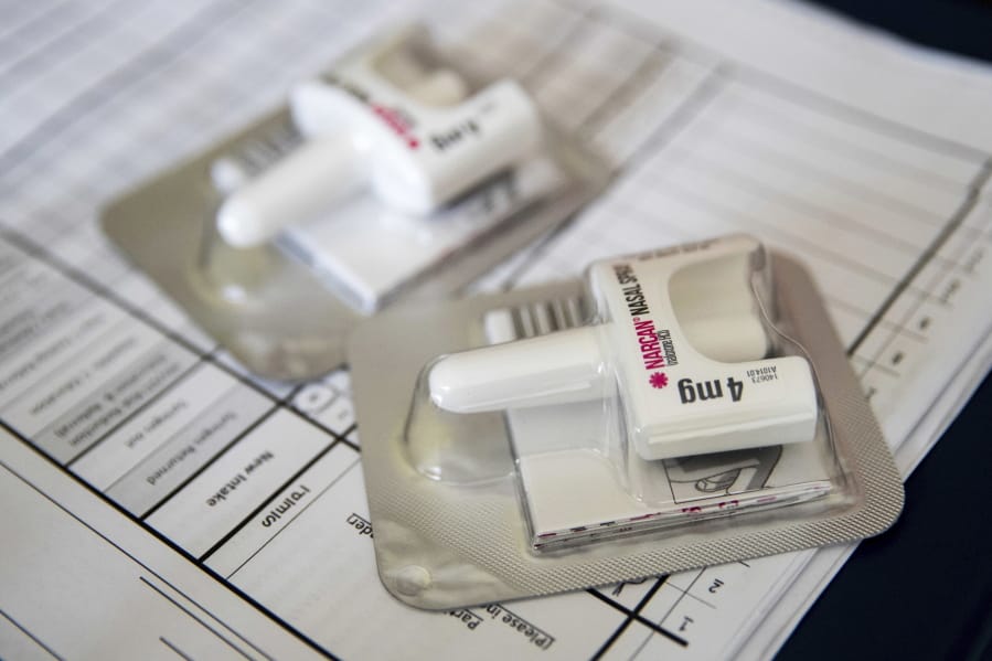 FILE - This July 3, 2018 file photo shows a Narcan nasal device which delivers naloxone in the Brooklyn borough of New York. On Tuesday, Aug. 6, 2019, health officials reported that prescriptions of the overdose-reversing drug naloxone are soaring, and experts say that could be a reason overdose deaths have stopped rising for the first time in nearly three decades.