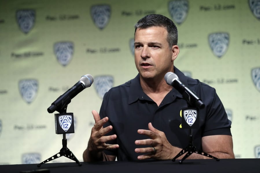 Oregon head coach Mario Cristobal answering questions during the Pac-12 Conference NCAA college football.