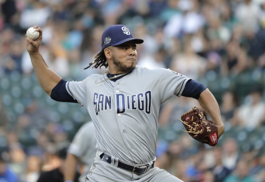 San Diego Padres starting pitcher Dinelson Lamet throws to a Seattle Mariners batter during the first inning of a baseball game Tuesday, Aug. 6, 2019, in Seattle. (AP Photo/Ted S.
