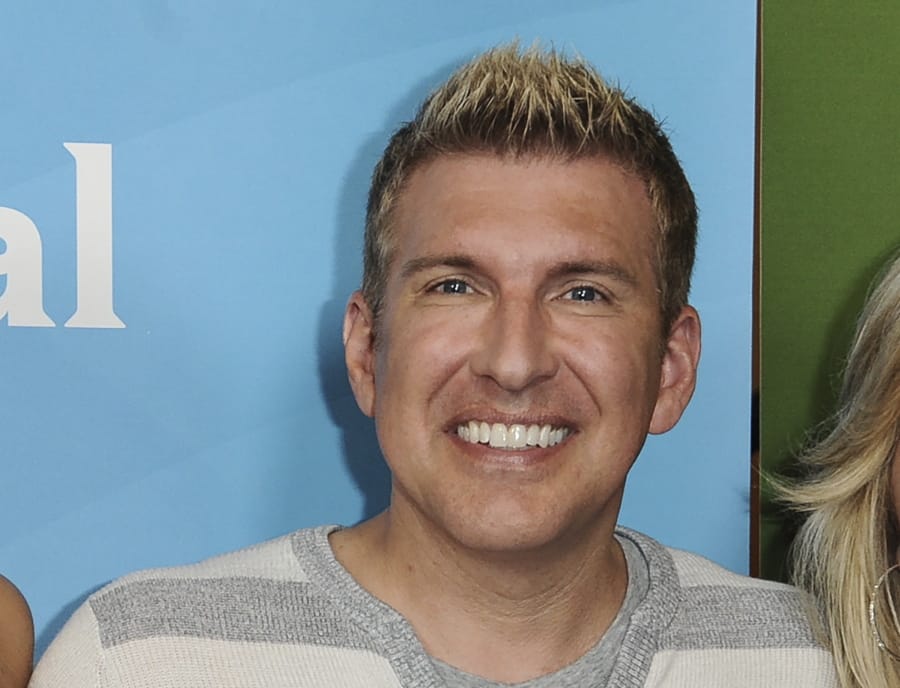 FILE - In this July 14, 2014, file photo, Todd Chrisley attends the NBC 2014 Summer TCA at the Beverly Hilton Hotel in Beverly Hills, Calif. A federal grand jury in Atlanta on Tuesday, Aug. 13, 2019, indicted reality television star Chrisley on tax evasion and other charges.