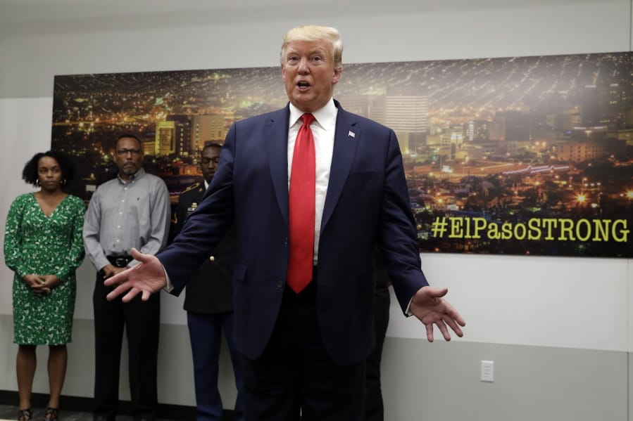President Donald Trump speaks to the media as he visits the emergency operations center after meeting with people affected by the El Paso mass shooting, Wednesday, Aug. 7, 2019, in El Paso, Texas.