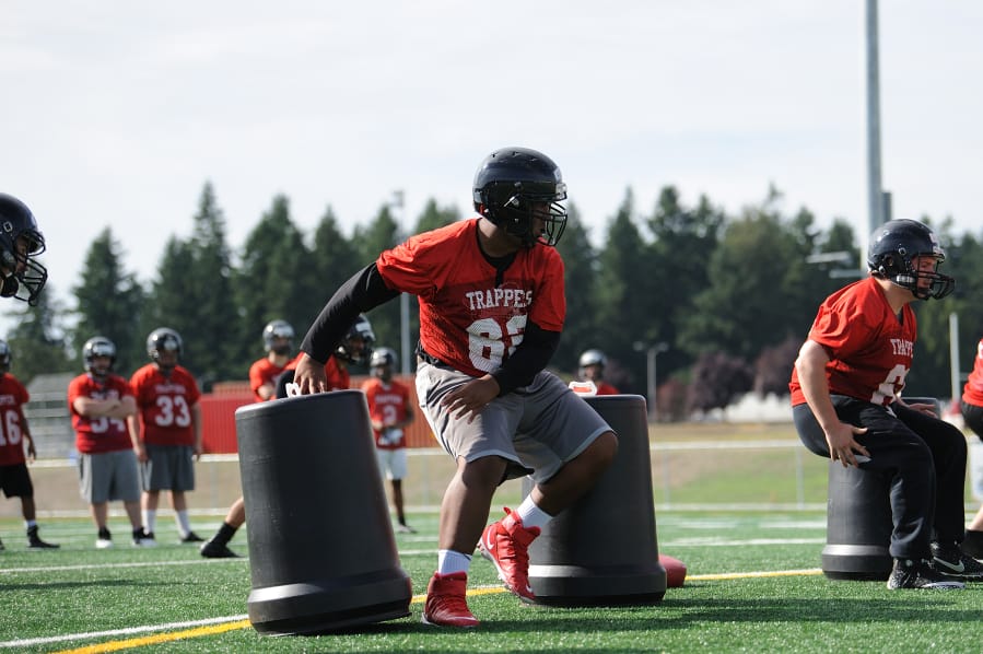 Fort Vancouver senior Aydin Scharbrough runs through drills at practice Aug. 23. The Trappers will play an independent schedule in 2019.
