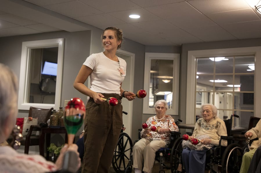 Molly Bybee, 29, a Brewerytown Philadelphia music therapist, sings for her class of residents at Paul&#039;s Run Halle Health Center on Aug.