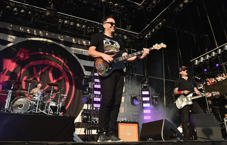 Recording artists Travis Barker, from left, Mark Hoppus and Matt Skiba of Blink 182 perform at the Firefly Music Festival on June 19, 2016, in Dover, Delaware.