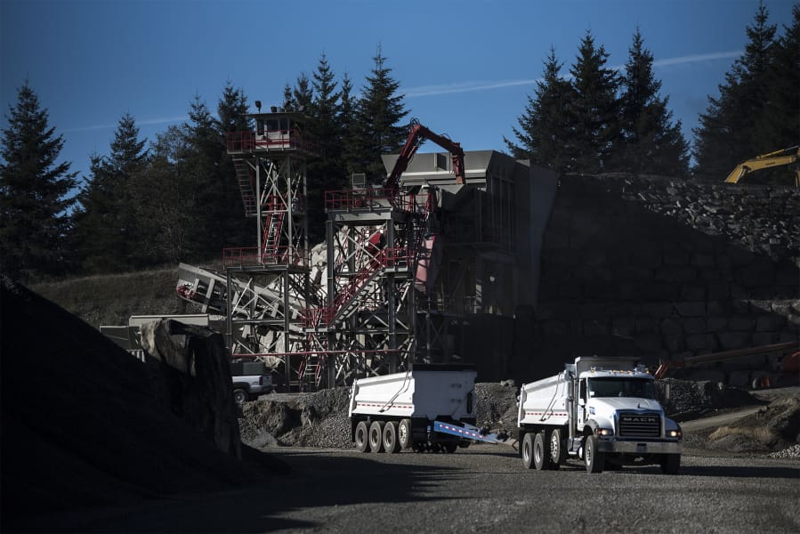 A truck hauls gravel across the quarry on Yacolt Mountain. The gravel is in demand, but nearby residents take a dimmer view of the mine.