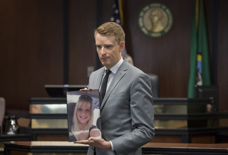 Deputy Prosecutor Kelly Ryan displays a photo of the victim, Amy Marie Hooser, for the jury during opening statements in the murder trial of Mitchell Heng on Tuesday morning in Clark County Superior Court. Heng is accused of killing Hooser, a clerk at Sifton Market, during a robbery and setting the business on fire.