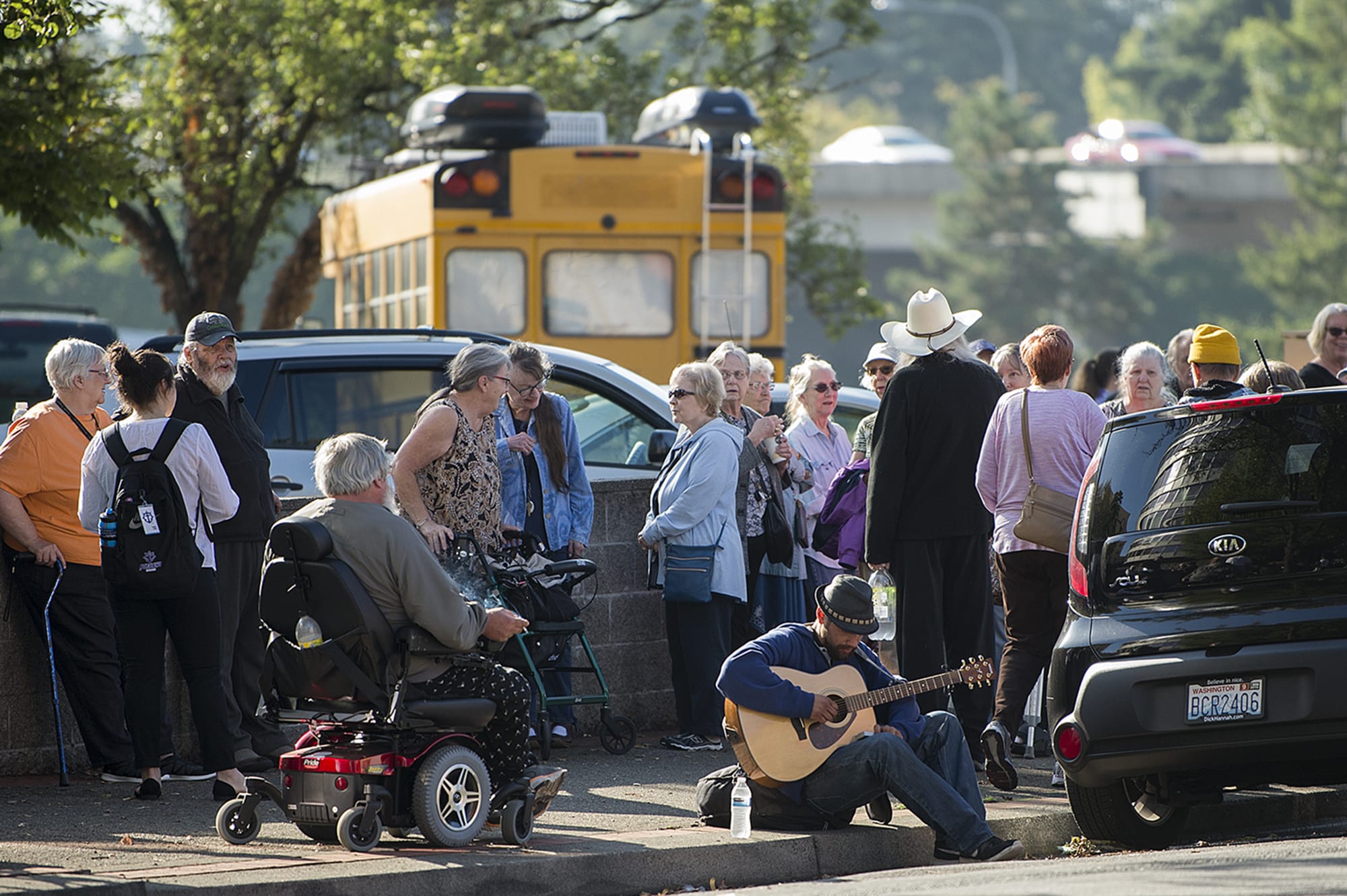People evacuated because of the reported gas leak in downtown Vancouver gather near the Smith Tower Apartments on Thursday morning, Sept. 12, 2019.