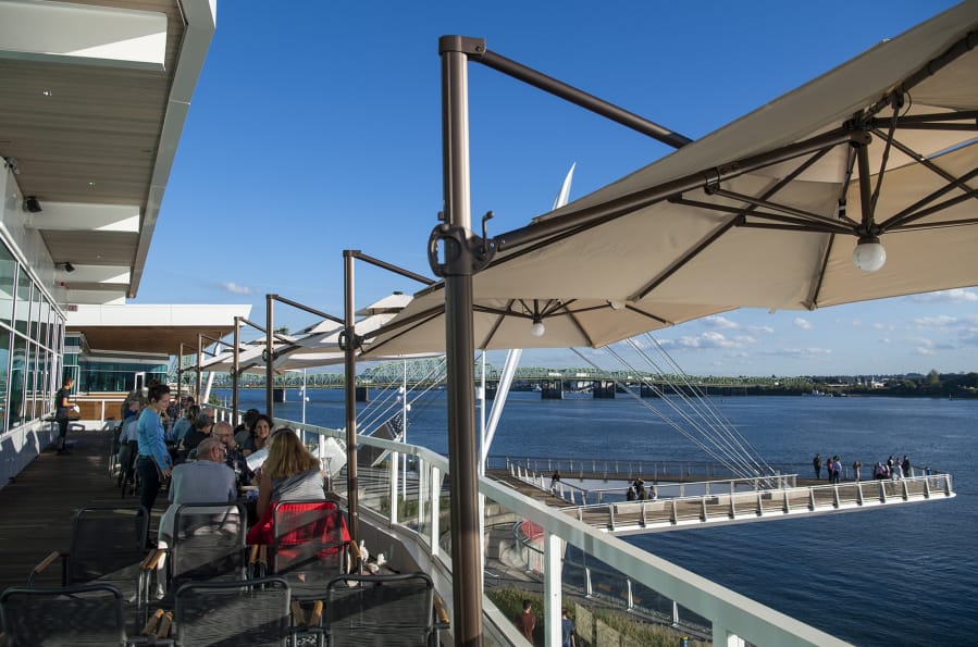 The second-story patio at Barlow's Public House has a view of the Columbia River.