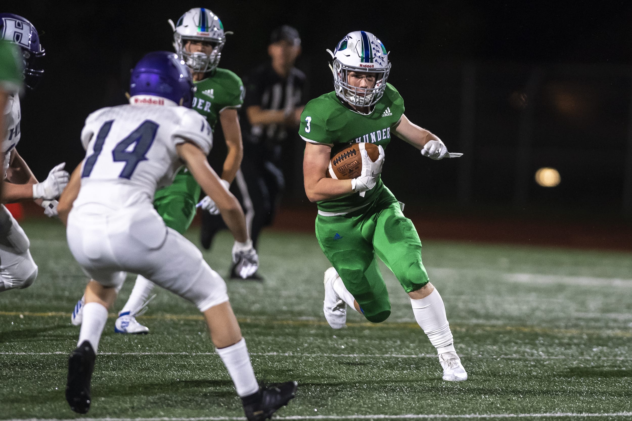 Mountain View’s Alec Cann runs the ball against Heritage during a game at McKenzie Stadium on Friday night, Sept 27, 2019.