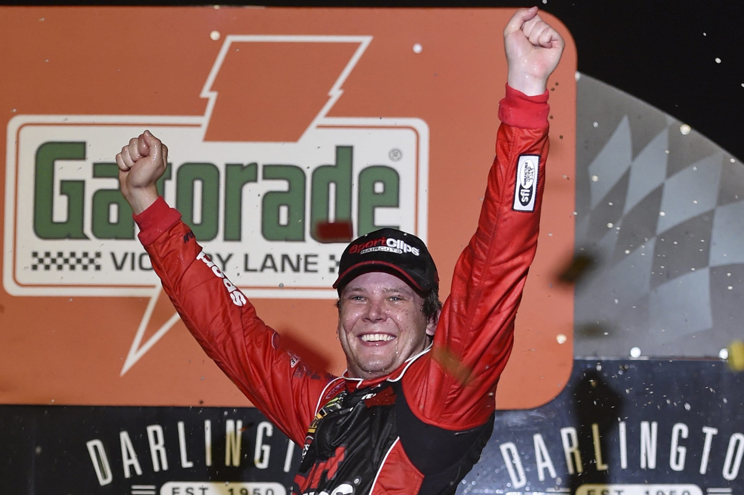 Erik Jones celebrates his victory after a NASCAR Cup Series auto race on Sunday, Sept. 1, 2019, at Darlington Raceway in Darlington, S.C. Jones held off Joe Gibbs Racing teammate Kyle Busch to win the rain-delayed Southern 500 that ended early Monday morning.