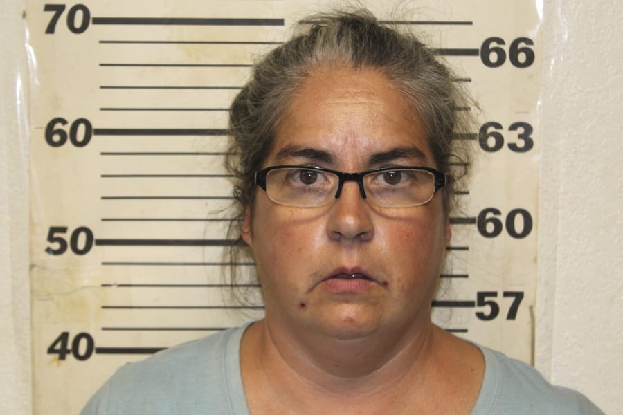 This undated photo provided by the Benton County, Mo., Sheriff&#039;s Office in Warsaw, Mo., shows Tiffany Woodington, whe was charged Friday, Sept. 20, 2019, in Missouri with 10 counts of felony animal abuse and two misdemeanor counts of animal abuse. Her husband, Steven Woodington, was charged Thursday in Texas with animal cruelty. A second man described as the caretaker also was charged in Texas with animal cruelty. All three are free on bond. face multiple charges after 120 dogs and a cat were found dead in Missouri and about two dozen more dogs died in Texas.