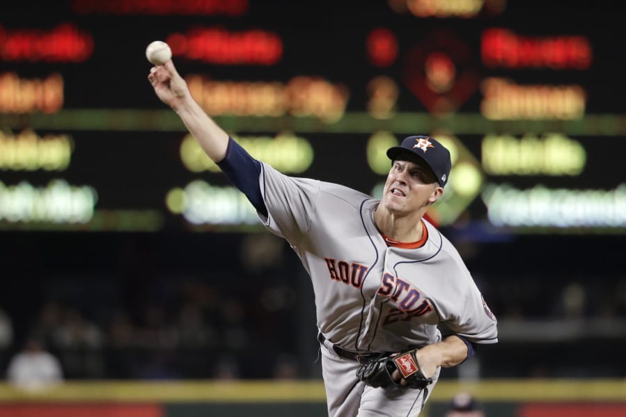 Houston Astros starting pitcher Zack Greinke throws to a Seattle Mariners batter during the fifth inning of a baseball game Wednesday, Sept. 25, 2019, in Seattle.