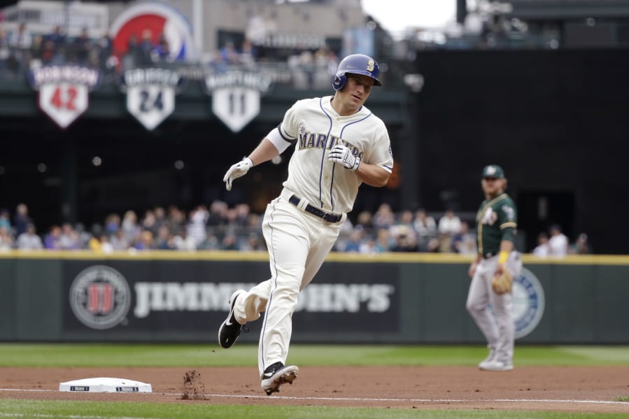 Seattle Mariners&#039; Kyle Seager rounds the bases on his two-run home run against the Oakland Athletics in the first inning of a baseball game Sunday, Sept. 29, 2019, in Seattle.