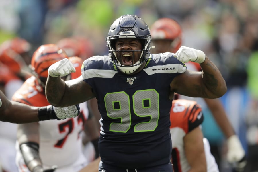 Seattle Seahawks defensive tackle Quinton Jefferson (99) reacts after he sacked Cincinnati Bengals quarterback Andy Dalton during the second half of an NFL football game Sunday, Sept. 8, 2019, in Seattle.