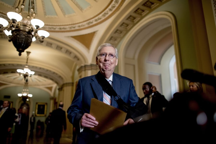 In this Sept. 10, 2019, photo, Senate Majority Leader Mitch McConnell of Ky., arrives for a news conference following a Senate policy luncheon on Capitol Hill in Washington. Fights over abortion and President Donald Trump’s U.S.-Mexico border wall have thrown Senate efforts to advance $1.4 trillion worth of agency spending bills into disarray, threatening one of Washington’s few bipartisan accomplishments this year.