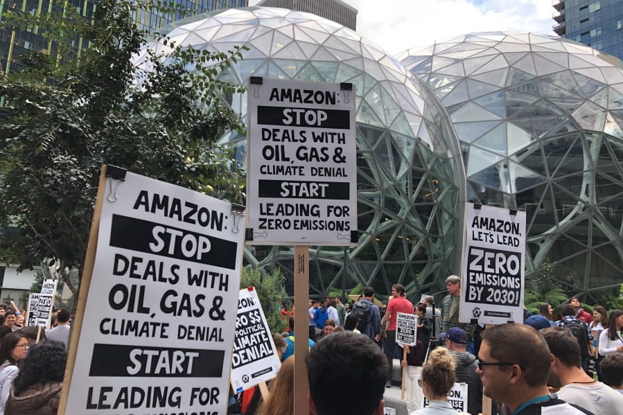 Amazon workers begin to gather in front of the Spheres, participating in the climate strike Friday in Seattle.