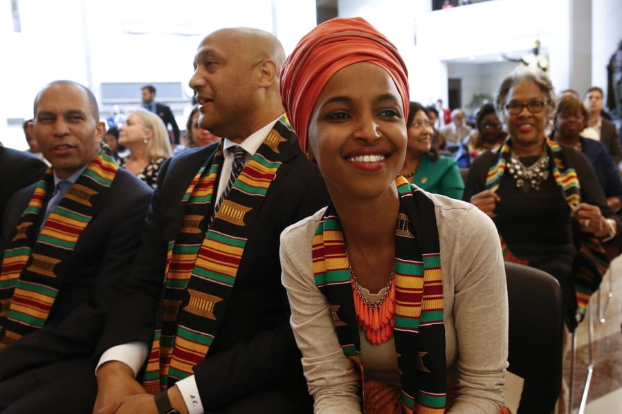 Rep. Ilhan Omar, D-Minn., attends a ceremony to commemorate the 400th anniversary of the first recorded arrival of enslaved African people in America, Tuesday, Sept. 10, 2019, on Capitol Hill in Washington.