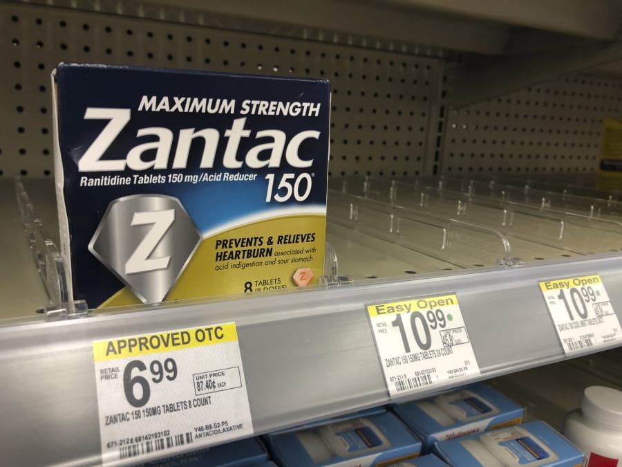 A box of Maximum Strength Zantac tablets is shown at a pharmacy, Monday, Sept. 30, 2019, in Miami Beach, Fla. CVS has halted sales of the popular heartburn treatment and the store generic version after warnings by U.S. health regulators.