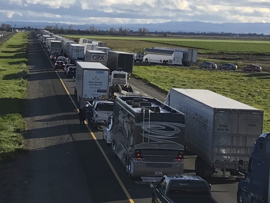 This Feb. 14, 2019, photo released by Caltrans District 3 shows a 7-mile back up on the South bound Interstate 5, as it reopens to traffic in Maxwell in Colusa County, Calif. The Trump administration is poised revoke California&#039;s authority to set auto mileage standards, asserting that only the federal government has the power to regulate greenhouse gas emissions and fuel economy.
