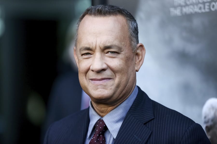 FILE - In this Sept. 8, 2016 file photo, Tom Hanks arrives at the premiere of &quot;Sully&quot; in Los Angeles.  Hanks will be the recipient of the Cecil B. DeMille Award at January&#039;s Golden Globes Awards.