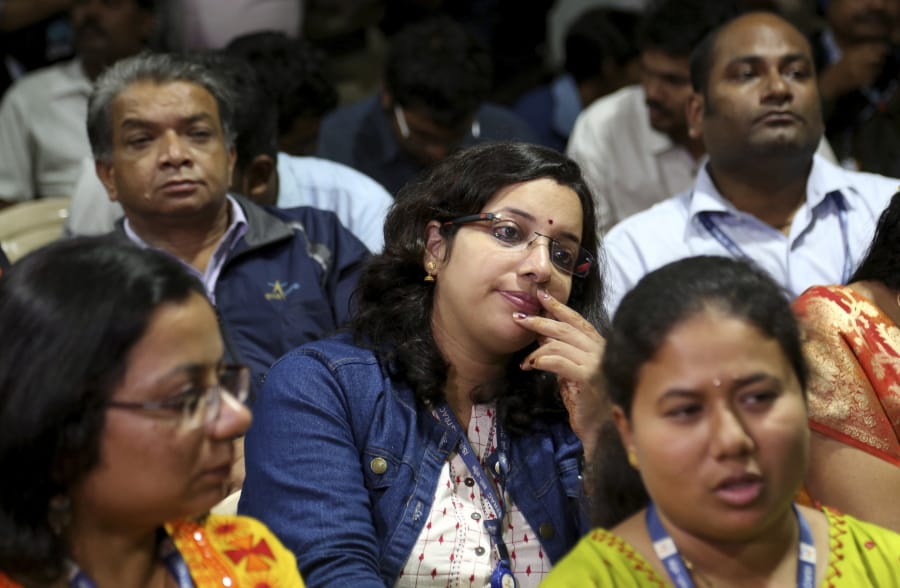 Indian Space Research Organization employees react after the announcement that the agency had lost touch with its Vikram lunar lander on Sept. 7 in Bangalore, India.