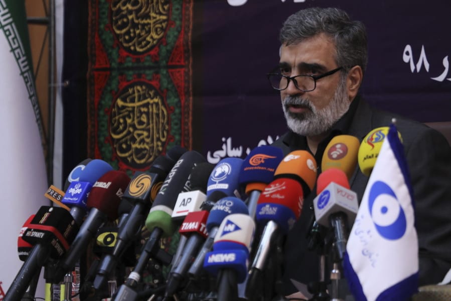 In this photo released by the Atomic Energy Organization of Iran, spokesman of the organization Behrouz Kamalvandi speaks in a news briefing in Tehran, Iran, Saturday, Sept. 7, 2019. Iran has begun injecting uranium gas into advanced centrifuges in violation of its 2015 nuclear deal with world powers, Kamalvandi said.