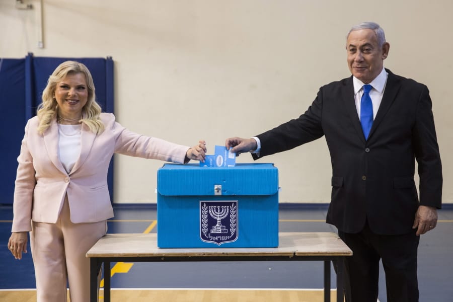 Israeli Prime Minister Benjamin Netanyahu supporters chant as the await results of the elections in Tel Aviv, Israel, Tuesday, Sept. 17, 2019.