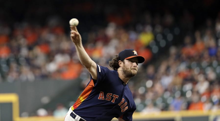 Houston Astros starting pitcher Gerrit Cole throws against the Seattle Mariners during the first inning of a baseball game Sunday, Sept. 8, 2019, in Houston. (AP Photo/David J.